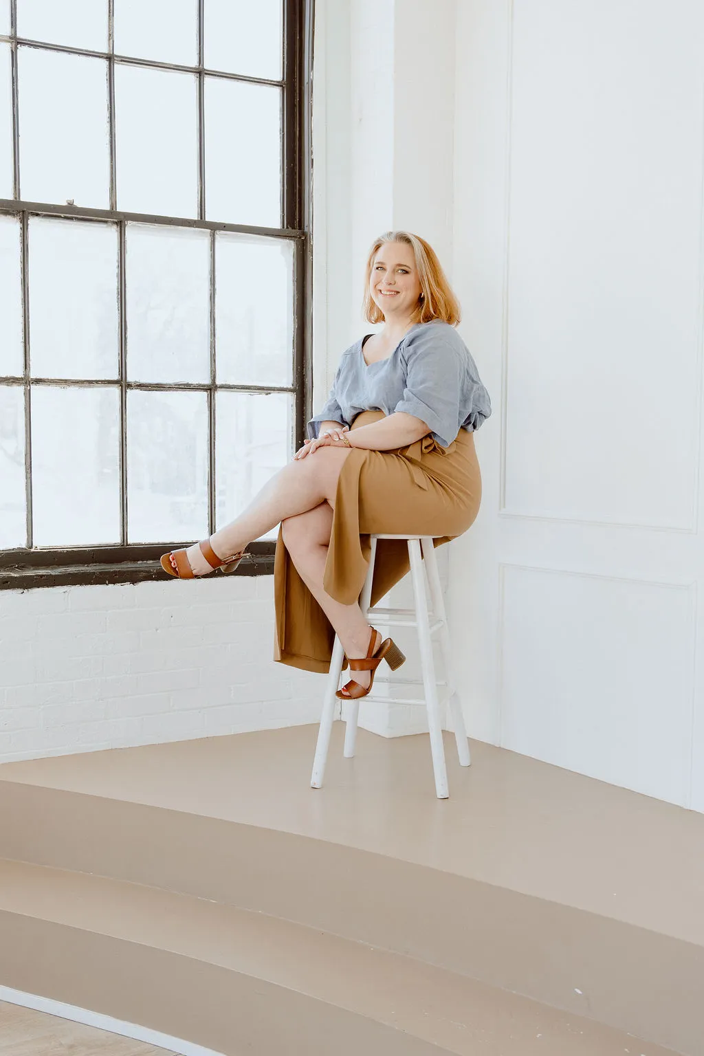 Image of Jessica smiling in a well lit room.